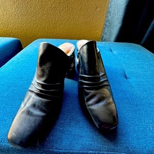 Vintage Halston Kelsey Black Mule with classic artsy heel.